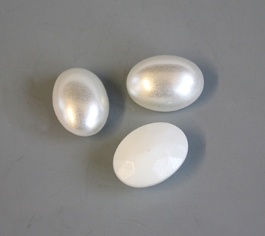 White oval cabochons